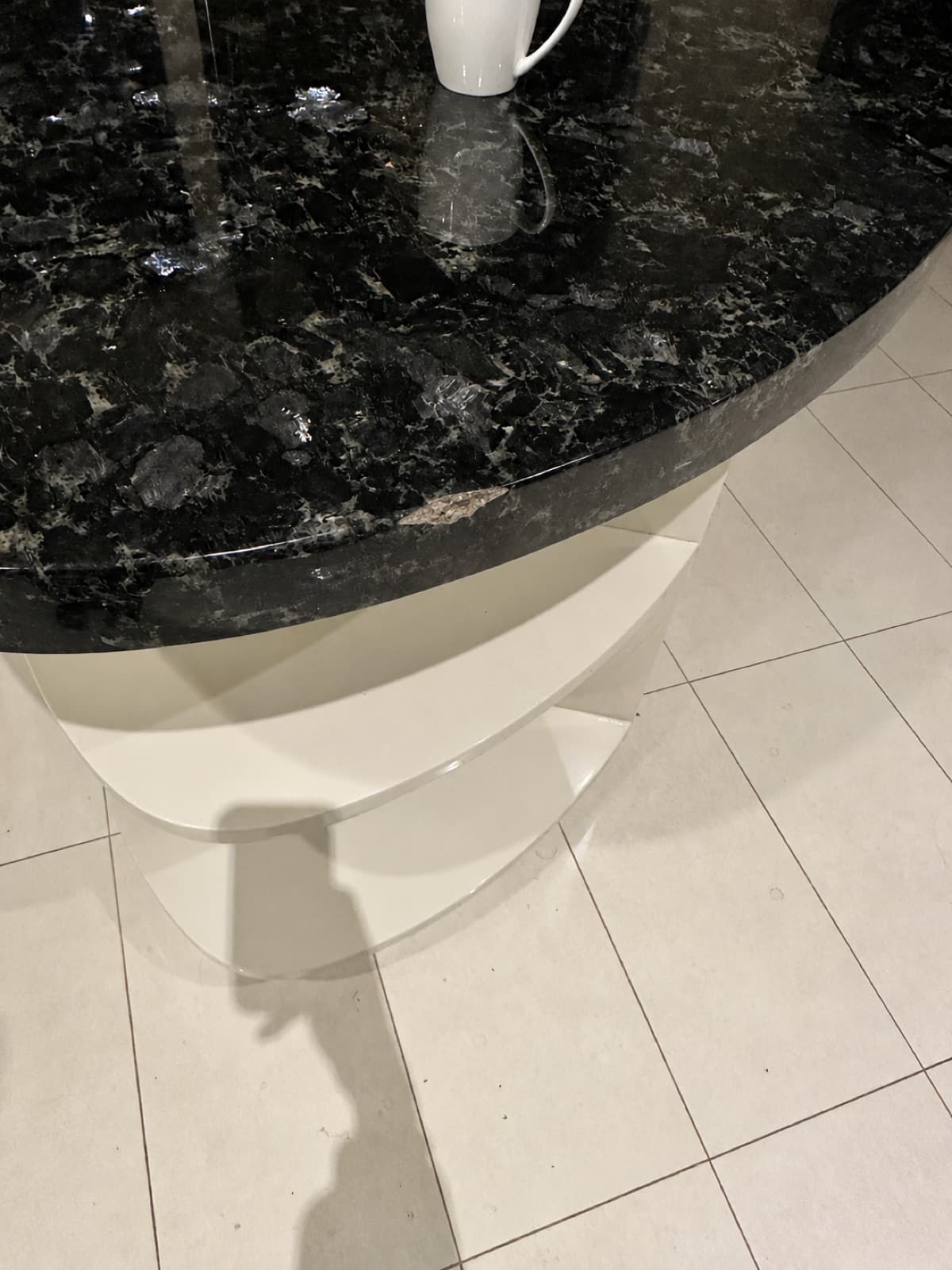 Example wide shot: a full stone benchtop and its surroundings.