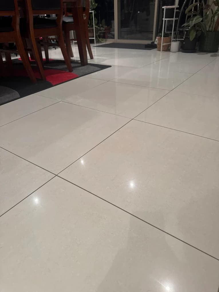 A repaired floor tile, photographed for a customer review.